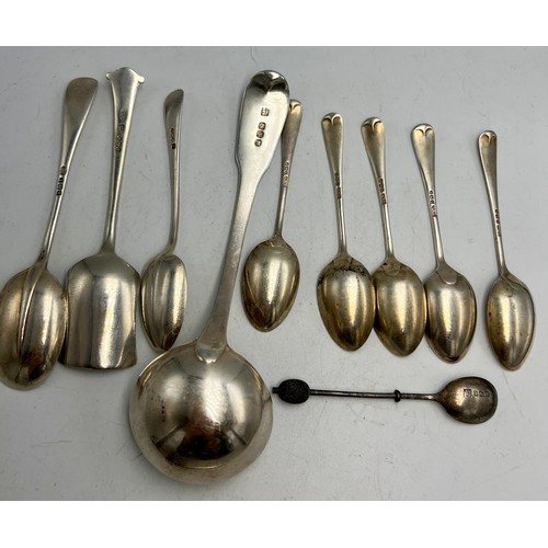 787 - Ten hallmarked silver spoons to include Georgian ladle London 1812, maker William Eley, William Fear... 