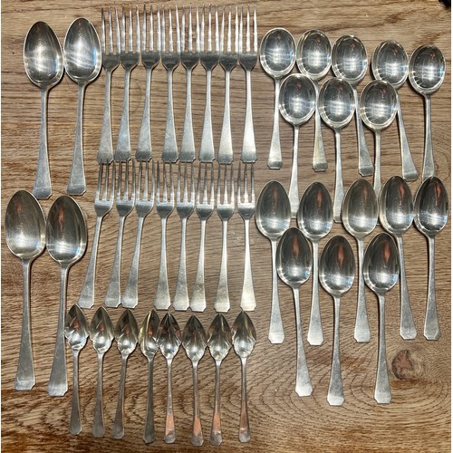 788 - A canteen of hallmarked silver cutlery in an oak cabinet comprising 8 soup spoons, 8 dessert spoons,... 