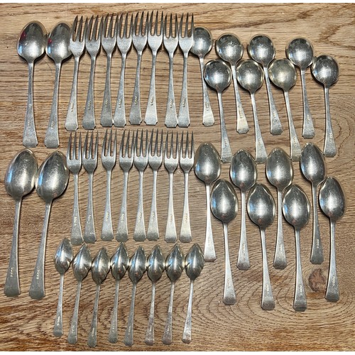 788 - A canteen of hallmarked silver cutlery in an oak cabinet comprising 8 soup spoons, 8 dessert spoons,... 