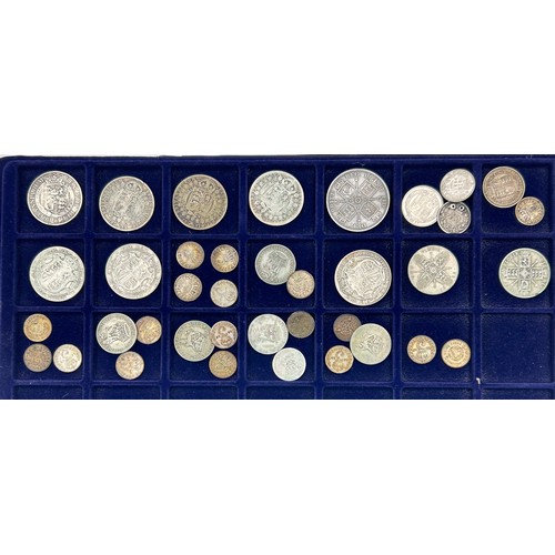 723 - A collection of coins and notes some silver to include 211g of pre 1921 silver coins, 310g of pre 19... 