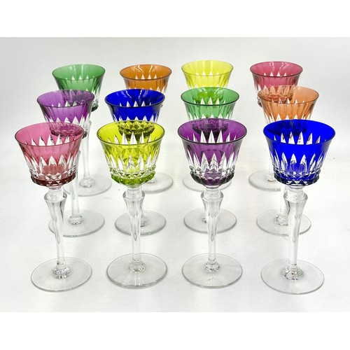 487 - A set of 12 Baccarat coloured cut crystal wine glasses in 6 colourways, 2 of each colour. 20cm h etc... 