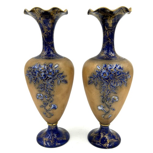 390 - A pair of 19thC ceramic vases with gilt edged floral design in cobalt blue and brown 29cm, indistinc... 