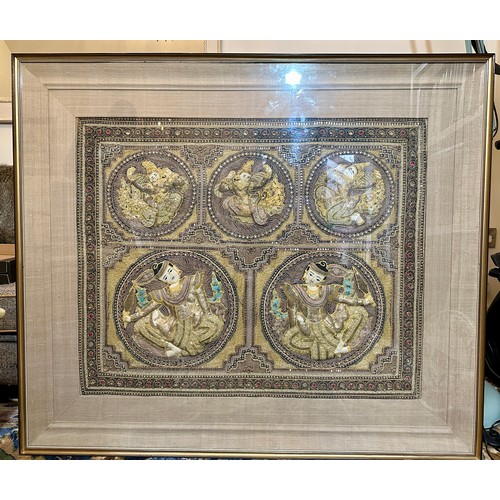 871 - A Burmese late 19thC framed relief panel with metal thread and bead work depicting five dancing figu... 