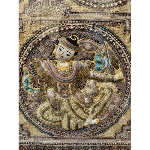 871 - A Burmese late 19thC framed relief panel with metal thread and bead work depicting five dancing figu... 