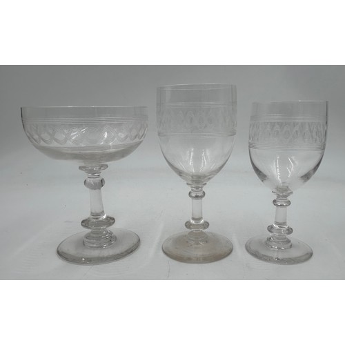 489 - A selection of mid century etched ribbon design glasses to include 10 x Champagne Coupes 12cm, 5 x s... 