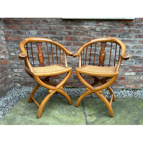 31 - Two Chinese horseshoe stickback elbow chairs. 86cm h to back, 49cm h to seat, 64cm w.