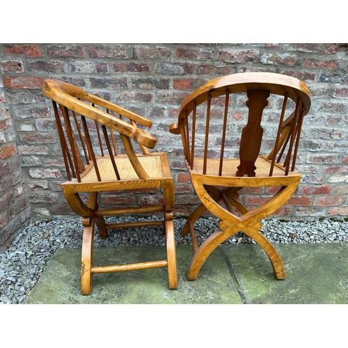 31 - Two Chinese horseshoe stickback elbow chairs. 86cm h to back, 49cm h to seat, 64cm w.