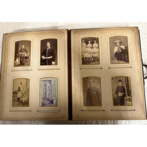 917 - A late 19thC Balmoral Musical Album with metal clasp containing 42 photographs and working musical m... 