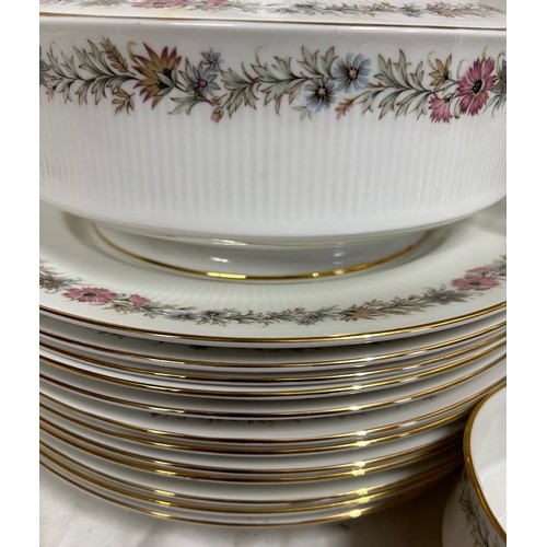 394 - A large quantity of Paragon 'Belinda' dinner and tea ware comprising : 12 x dinner plates, 2 x lidde... 