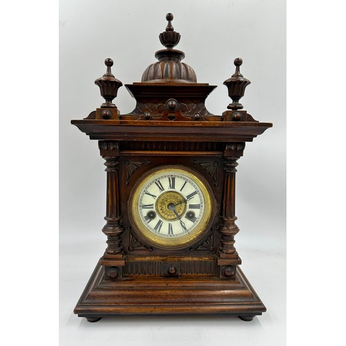 986 - A late 19thC German mahogany architectural mantel clock, 'The Greenwich Clock' made in Württemberg f... 