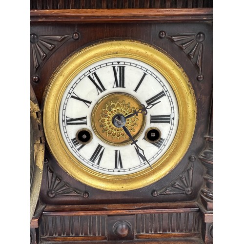 986 - A late 19thC German mahogany architectural mantel clock, 'The Greenwich Clock' made in Württemberg f... 