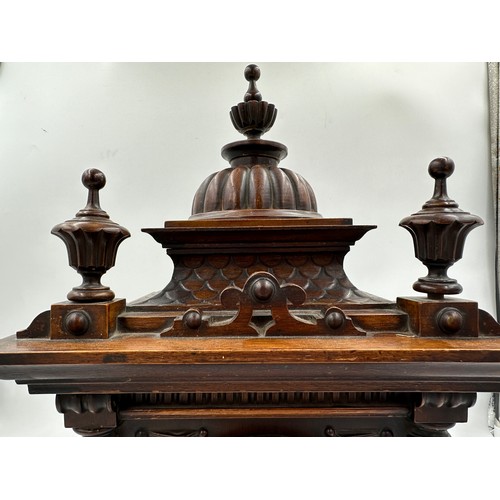 986 - A late 19thC German mahogany architectural mantel clock, 'The Greenwich Clock' made in Württemberg f... 