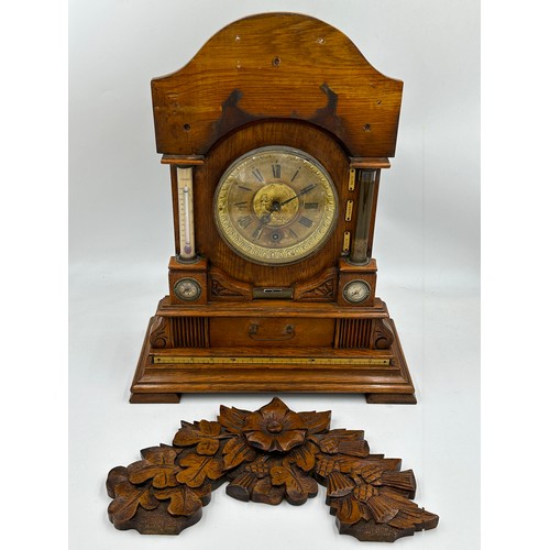 987 - A late Victorian oak cased bracket clock by The British United Clock Company with integrated thermom... 