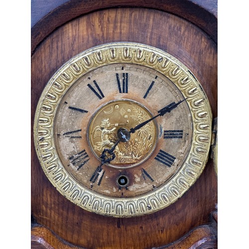 987 - A late Victorian oak cased bracket clock by The British United Clock Company with integrated thermom... 