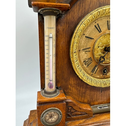 987 - A late Victorian oak cased bracket clock by The British United Clock Company with integrated thermom... 