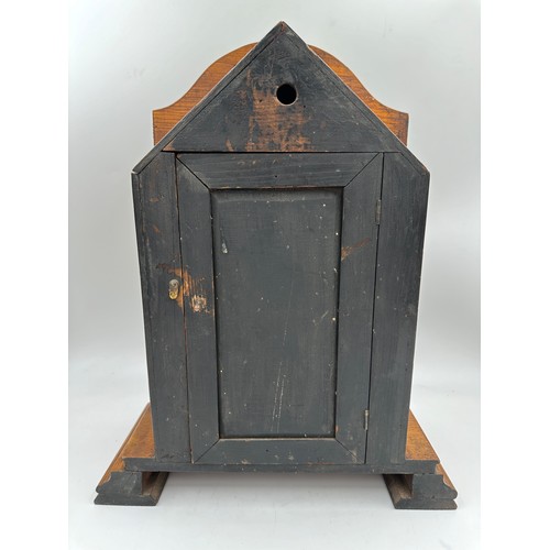 987 - A late Victorian oak cased bracket clock by The British United Clock Company with integrated thermom... 