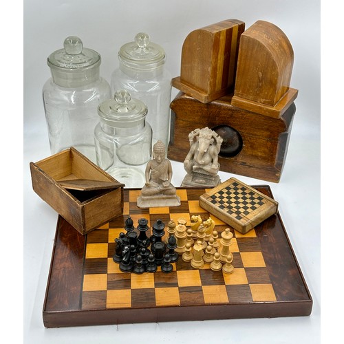 1175 - A miscellany to include satin wood and mahogany chess board, together with a full set of wooden ches... 