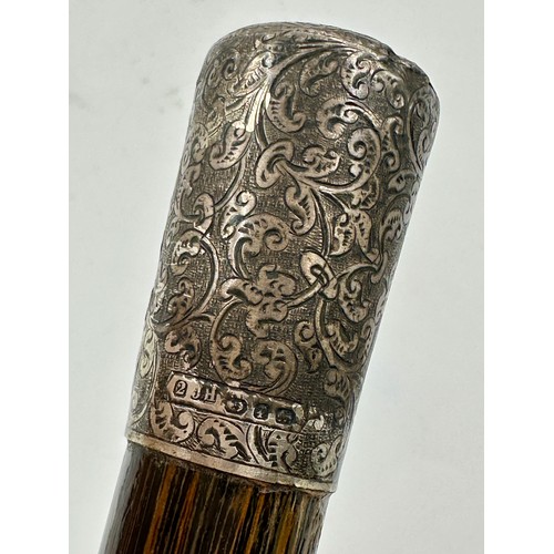 1176 - A coromandel and hallmarked silver walking cane with inscription 1892 Warrington to top, marks indis... 