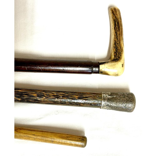 1176 - A coromandel and hallmarked silver walking cane with inscription 1892 Warrington to top, marks indis... 