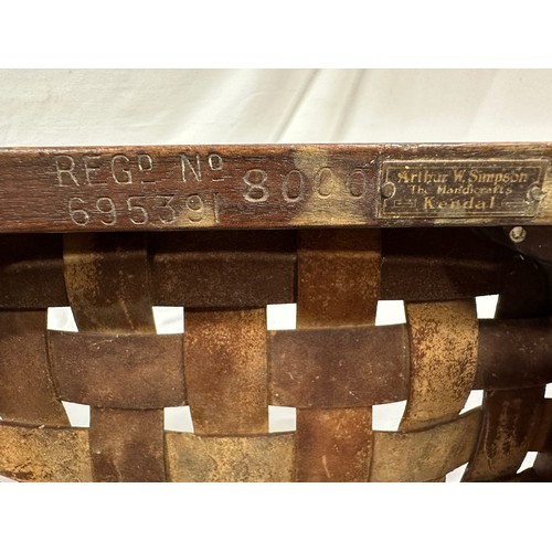 32 - Arthur W. Simpson, Kendal, an Arts and Crafts stool in oak, with original woven strap seat, and make... 