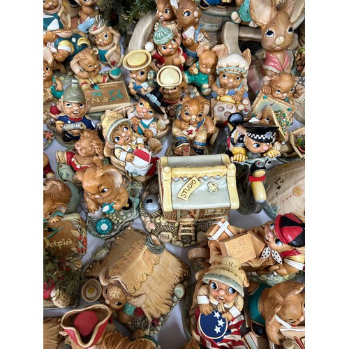 395 - A large collection of 150+ Pendelfin figurines some in original boxes, houses, backdrops, trees and ... 