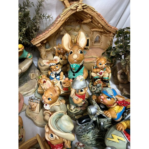 395 - A large collection of 150+ Pendelfin figurines some in original boxes, houses, backdrops, trees and ... 