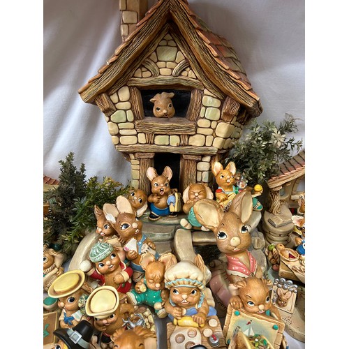 395 - A large collection of 150+ Pendelfin figurines some in original boxes, houses, backdrops, trees and ... 