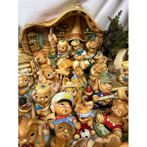 395 - A large collection of 150+ Pendelfin figurines some in original boxes, houses, backdrops, trees and ... 