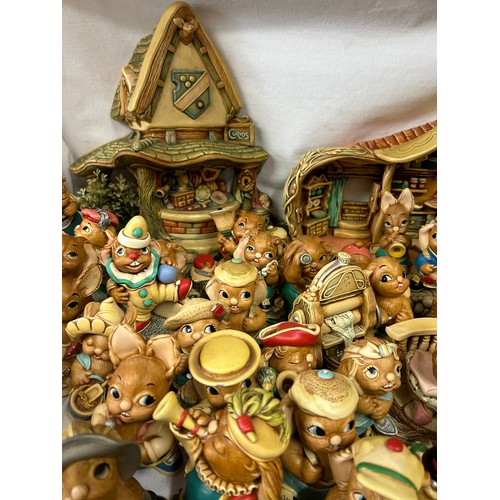 395 - A large collection of 150+ Pendelfin figurines some in original boxes, houses, backdrops, trees and ... 