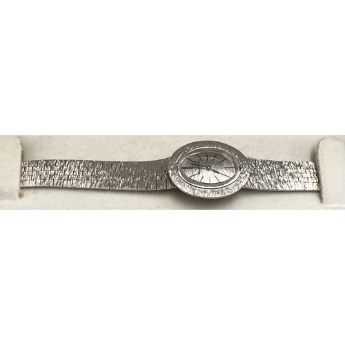 708 - A 9 carat white gold Bueche Girod ladies wristwatch. Weight 26.6gm.