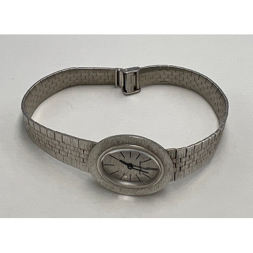 708 - A 9 carat white gold Bueche Girod ladies wristwatch. Weight 26.6gm.