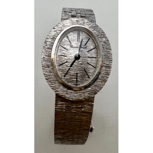 708 - A 9 carat white gold Bueche Girod ladies wristwatch. Weight 26.6gm.