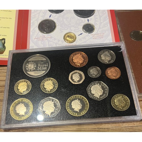 724 - Coins to include Olympic Legends, 1974 proof set decimal coins, 2010 coin set, British Military Mone... 