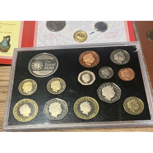 724 - Coins to include Olympic Legends, 1974 proof set decimal coins, 2010 coin set, British Military Mone... 