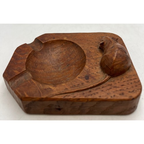 128 - A Robert Thompson Mouseman oak ashtray. 10cm x 7.5cm.