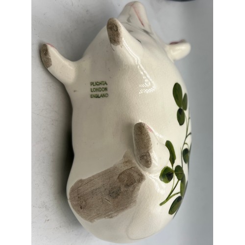 398 - A Wemyss Plichta pig money box. 17cm l.