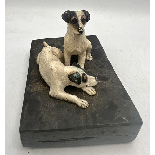 1182 - Two cold painted bronze terriers on a slate base. 10.5cm x 7cm.