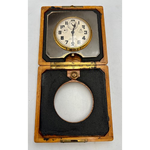 988 - Waltham ship watch/chronometer in fitted oak case. 12cm x 12cm.