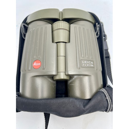 959 - A pair of Leica 7x42 BA Trinovid binoculars in Leica soft case together with cased vintage opera gla... 