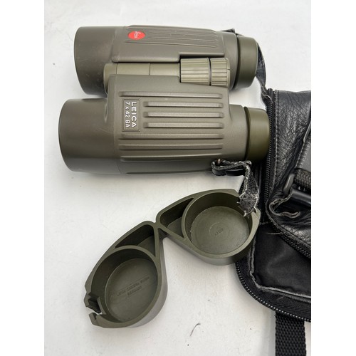 959 - A pair of Leica 7x42 BA Trinovid binoculars in Leica soft case together with cased vintage opera gla... 