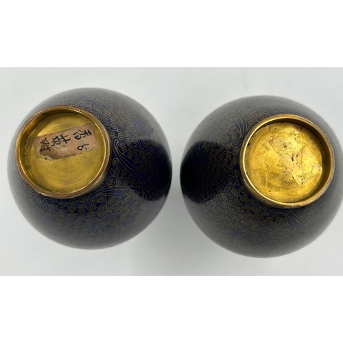 934 - A pair of 19thC Chinese cloisonné vases with blue and gold pattern 16cm. (2).