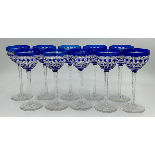 494 - A set of 10 x blue Val St Lambert cut glass rounded hock glasses with hexagonal stems and decorated ... 