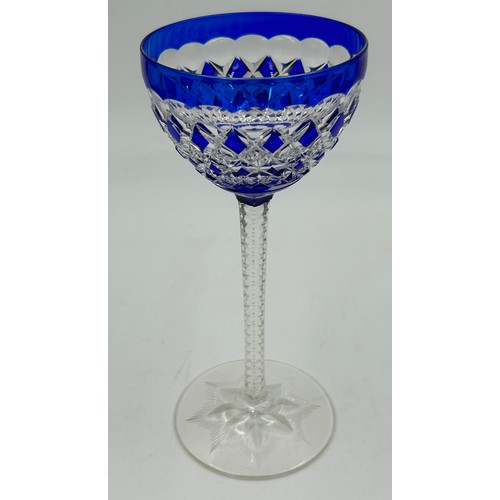 494 - A set of 10 x blue Val St Lambert cut glass rounded hock glasses with hexagonal stems and decorated ... 