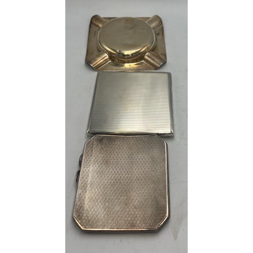 807 - Two silver cigarette cases and an ashtray. Total weight 291gm. Various dates and makers.