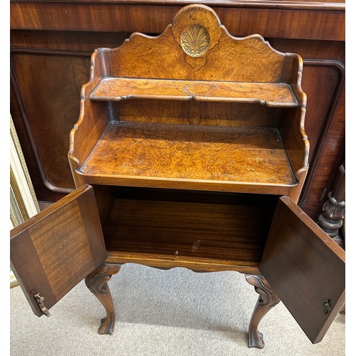 35 - A burr walnut two door cabinet on cabriole legs. 50 w x 34 d x 82.5cm h.