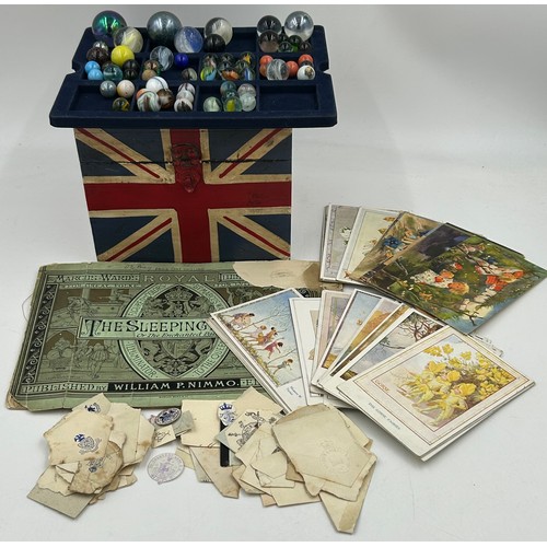 1186 - A miscellaneous lot to include Vintage Glass Marbles (59),  48 x 'Fairy' postcards with 28 by Margar... 