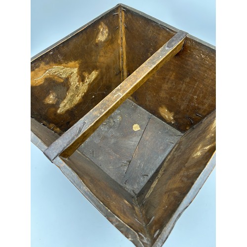 1187 - A Chinese rice measure with large metal staples to edges. 39w x 39 x 26cmh.