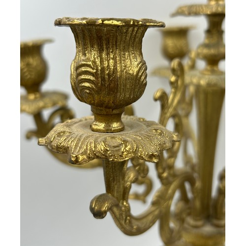 1191 - A pair of 20thC French style candelabras, gilt metal and blue porcelain 54cm h together with a gilt ... 