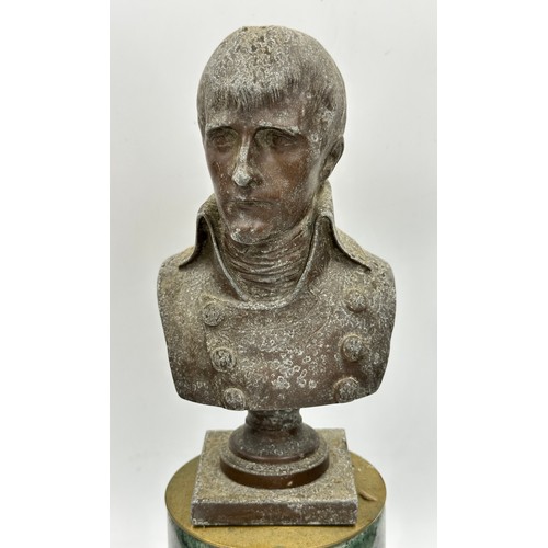 1201 - A metal bust of Napoleon on a marble pedestal 40cm high. Together with a pair of decorative marble o... 