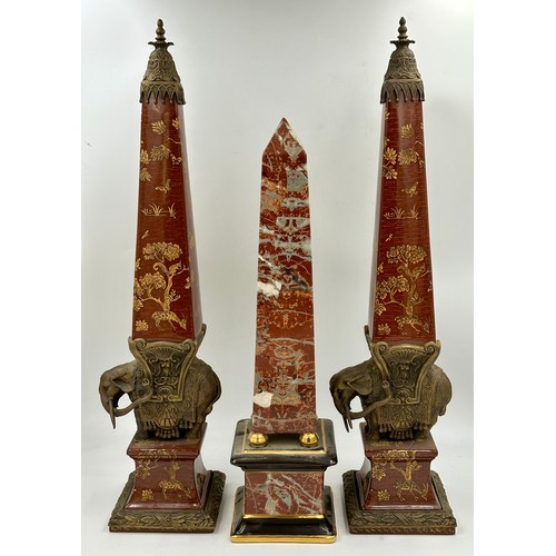 938 - A pair of Wong Lee ceramic and brass obelisks, decorated with deer, trees and butterflies mounted on... 